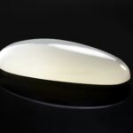Showing a milky white moonstone in the context of moonstone gemstone meaning