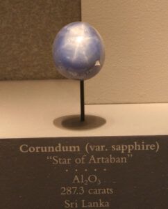 Showing an image of a blue star sapphire